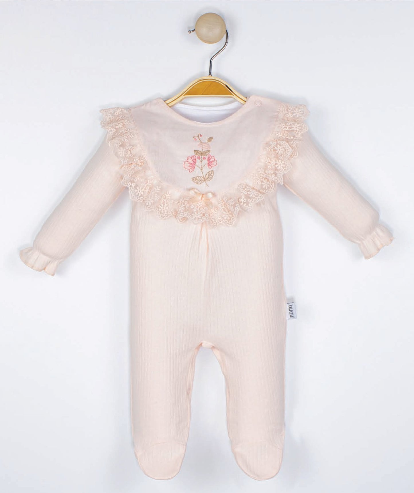 Grenouillère chic pour fille avec dentelles