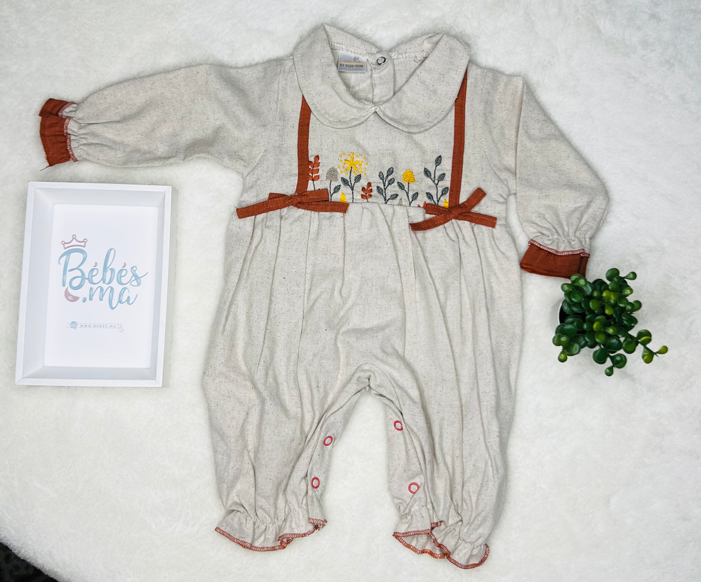 Barboteuse chic pour fille avec broderie