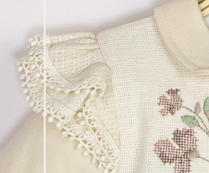 Barboteuse chic avec broderie et nœud pour fille